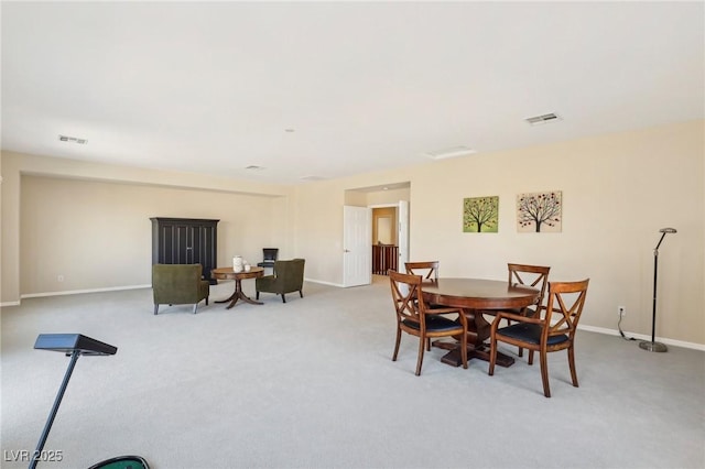 dining room featuring visible vents, carpet flooring, and baseboards