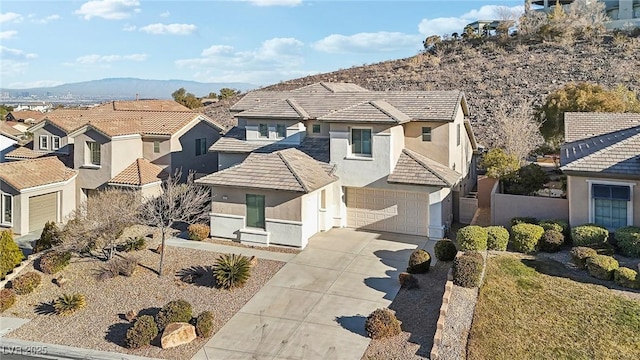 view of front of home featuring a mountain view