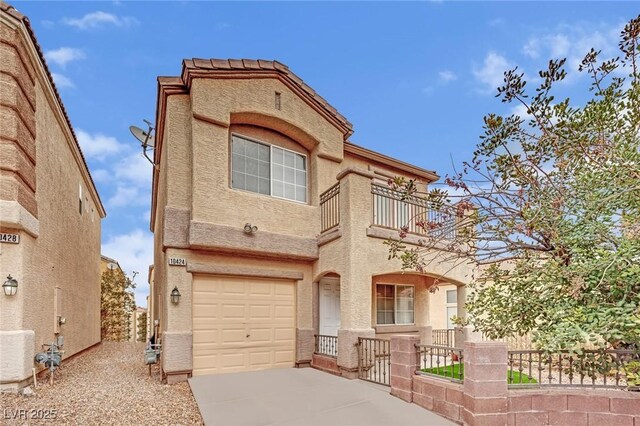 view of front of home featuring a garage and a balcony