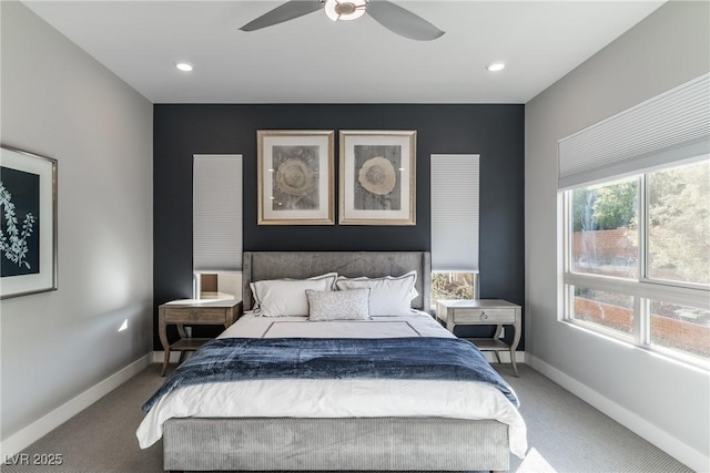 carpeted bedroom featuring ceiling fan