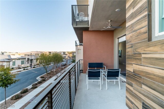 balcony featuring ceiling fan