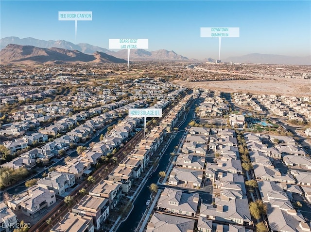 drone / aerial view featuring a mountain view