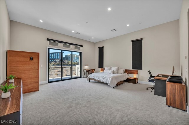 carpeted bedroom featuring access to exterior