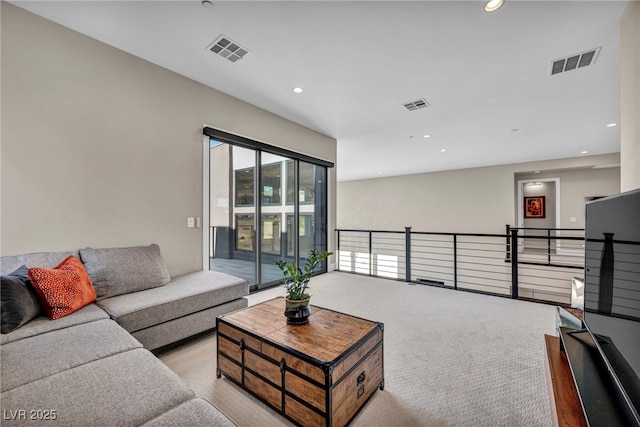 living room featuring light colored carpet