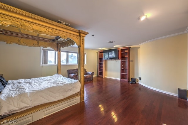 bedroom featuring dark wood-style floors, baseboards, visible vents, and crown molding