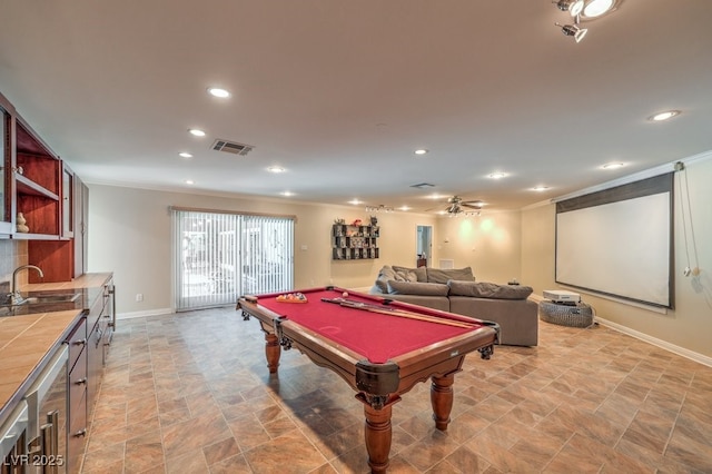 rec room with recessed lighting, visible vents, ornamental molding, a sink, and billiards