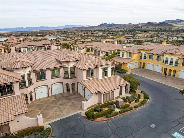 bird's eye view with a mountain view