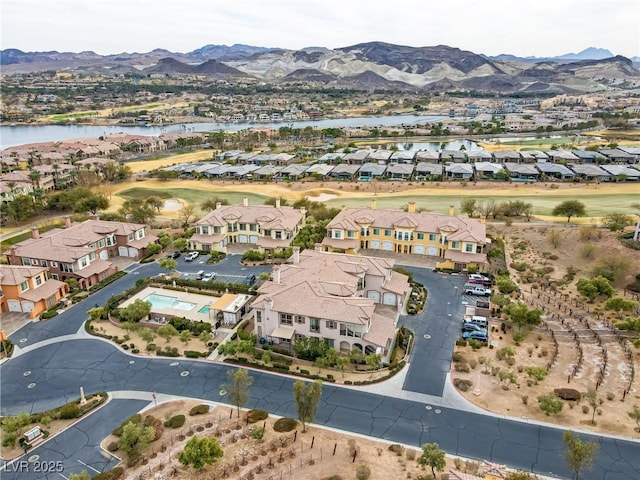 aerial view with a water and mountain view