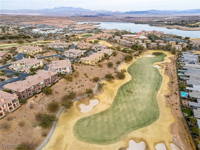 bird's eye view with a water and mountain view