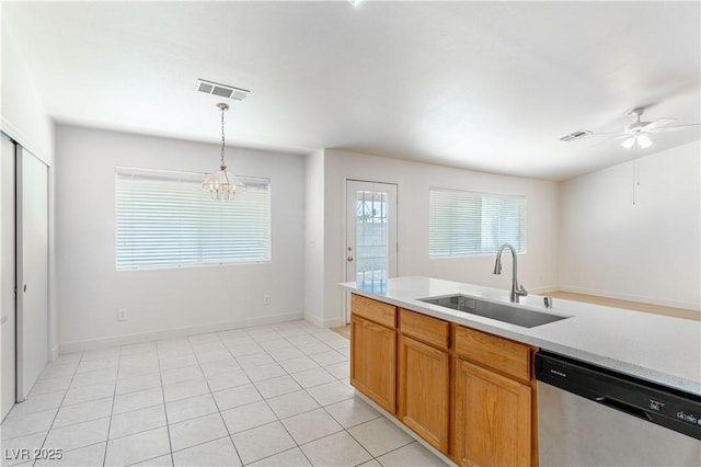 4507 Golden Palomino Ln, North Las Vegas, NV 89032 - kitchen featuring dishwasher, a sink, pendant lighting, a ceiling fan, and light countertops