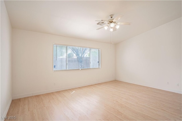 4507 Golden Palomino Ln, North Las Vegas, NV 89032 - spare room featuring wood finished floors, ceiling fan, and baseboards