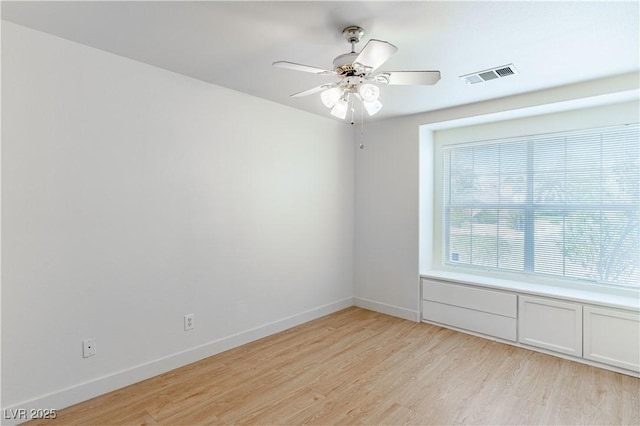 4507 Golden Palomino Ln, North Las Vegas, NV 89032 - empty room featuring healthy amount of natural light, light wood-style flooring, and baseboards
