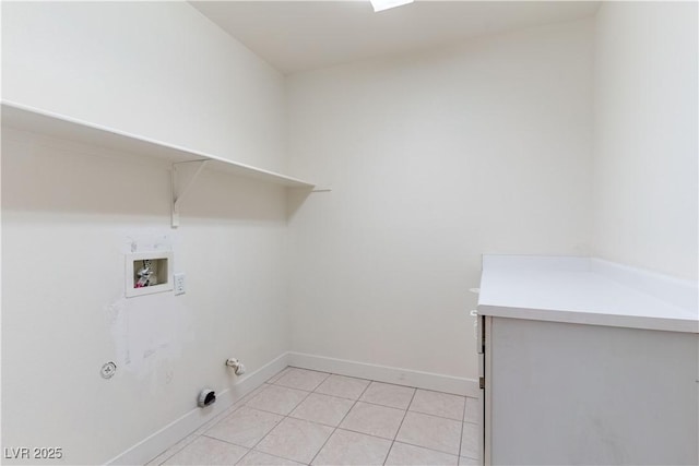 4507 Golden Palomino Ln, North Las Vegas, NV 89032 - washroom featuring gas dryer hookup, washer hookup, baseboards, and light tile patterned floors