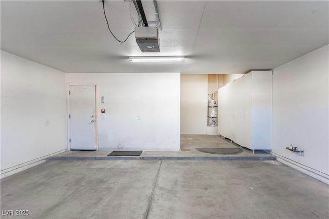 4507 Golden Palomino Ln, North Las Vegas, NV 89032 - garage featuring a garage door opener and a central vacuum unit