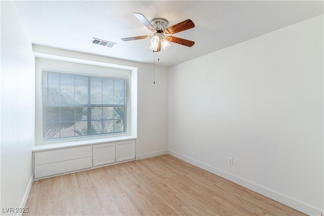 4507 Golden Palomino Ln, North Las Vegas, NV 89032 - empty room featuring light wood finished floors, a ceiling fan, and baseboards