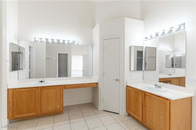 4507 Golden Palomino Ln, North Las Vegas, NV 89032 - full bath featuring two vanities and tile patterned floors