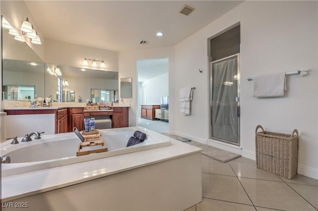 bathroom featuring vanity, tile patterned floors, and plus walk in shower