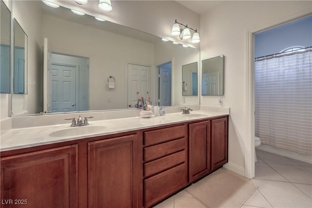 bathroom featuring tile patterned floors, toilet, a shower with shower curtain, and vanity