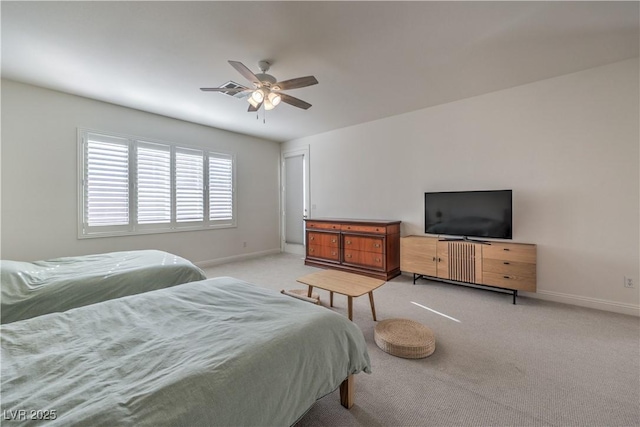 bedroom with light colored carpet and ceiling fan