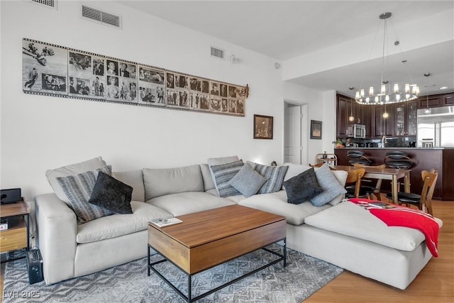 living room with light hardwood / wood-style floors