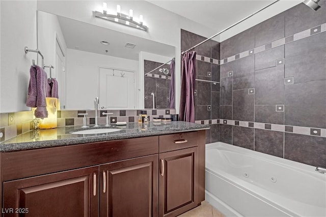 bathroom featuring vanity and shower / tub combo with curtain