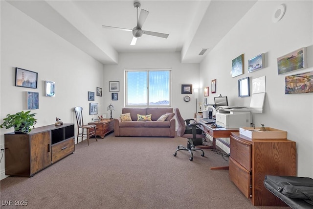 home office with light carpet and ceiling fan