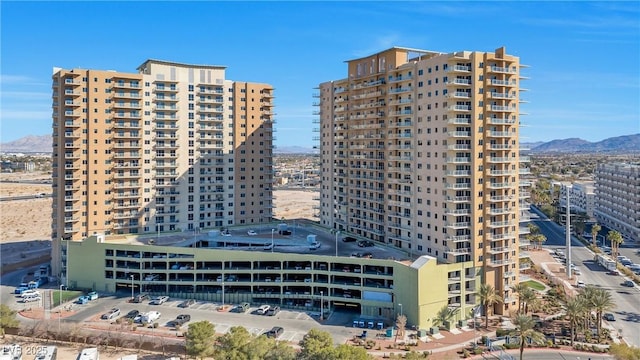 view of building exterior with a mountain view