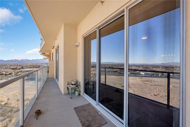 balcony featuring a mountain view