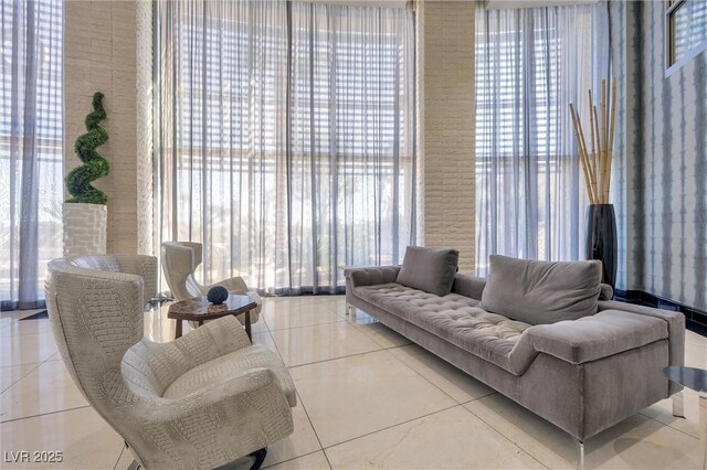 living room with tile patterned floors