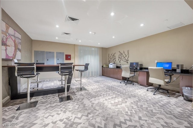 office space with light colored carpet