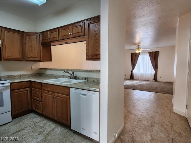 kitchen featuring electric stove, sink, ceiling fan, light carpet, and stainless steel dishwasher