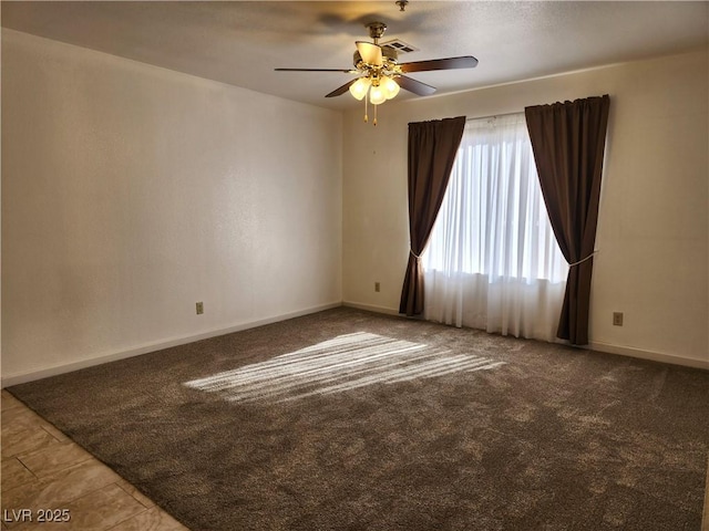 carpeted empty room with ceiling fan