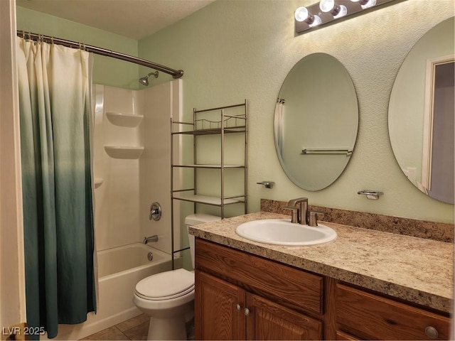 full bathroom featuring vanity, toilet, tile patterned flooring, and shower / tub combo