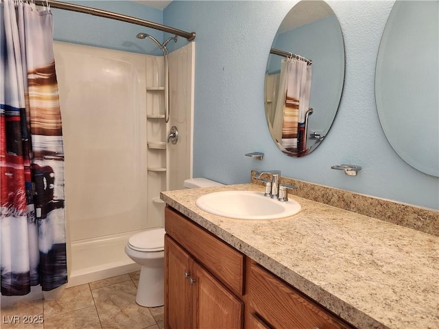 full bathroom featuring vanity, toilet, tile patterned flooring, and shower / bath combo with shower curtain