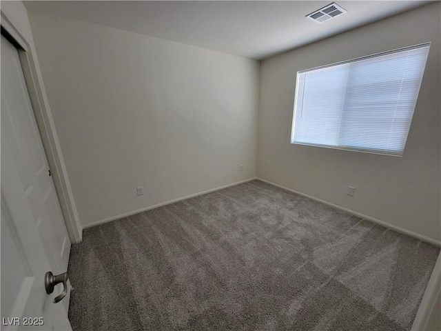 view of carpeted spare room