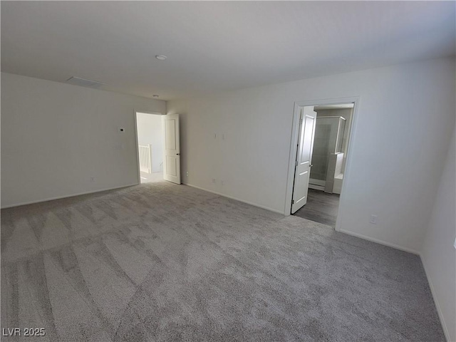 spare room with carpet