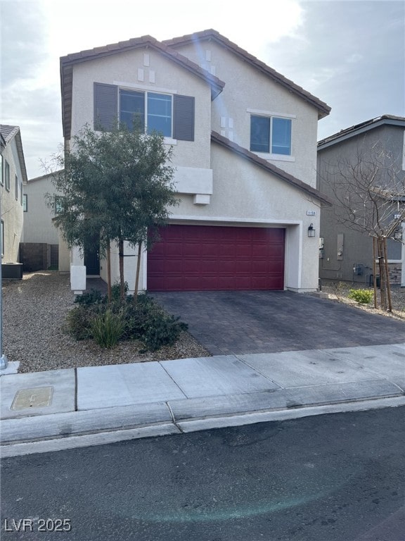 front facade with a garage