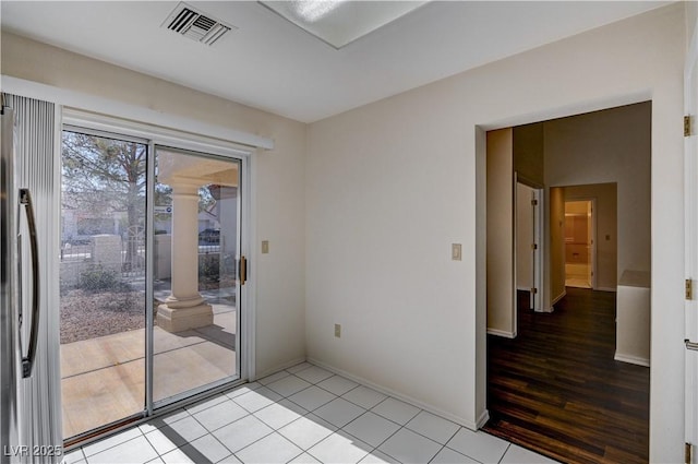 empty room with light wood-type flooring