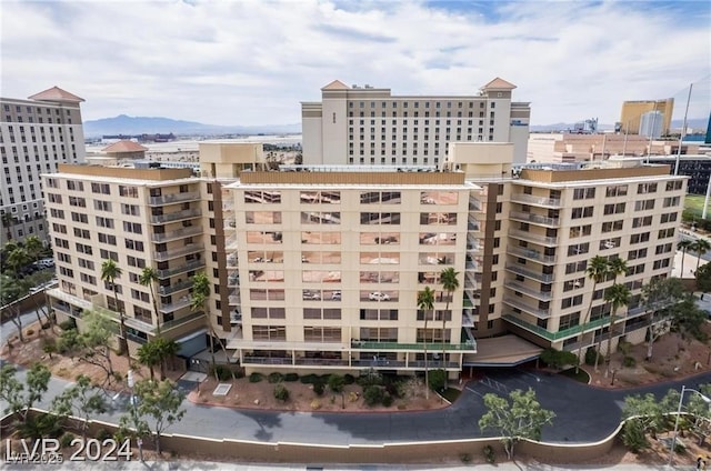 view of building exterior featuring a mountain view