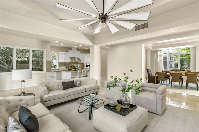 living room with an inviting chandelier