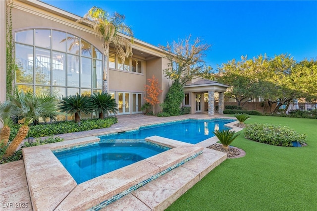 1549 Foothills Village Dr, Henderson, NV 89012 - view of pool featuring a lawn, a pool with connected hot tub, and french doors