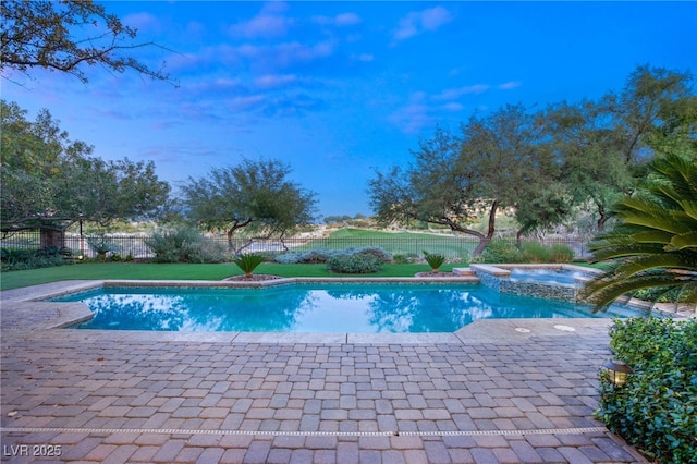 1549 Foothills Village Dr, Henderson, NV 89012 - view of swimming pool with a fenced backyard, a patio area, a pool with connected hot tub, and a yard