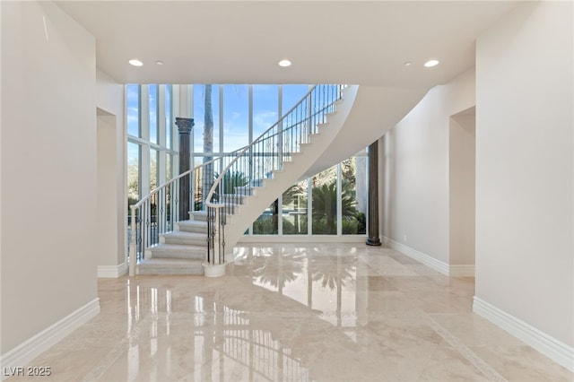 1549 Foothills Village Dr, Henderson, NV 89012 - stairs featuring recessed lighting, baseboards, and marble finish floor