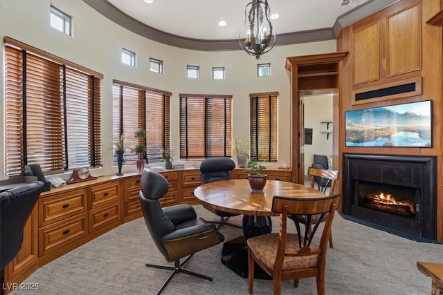 interior space featuring ornamental molding and a notable chandelier