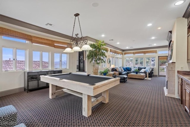 rec room featuring billiards, plenty of natural light, and dark colored carpet