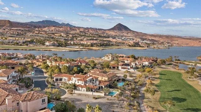 bird's eye view featuring a water and mountain view