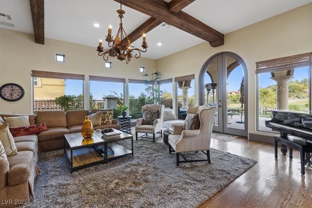 22 Rue Grimaldi Way, Henderson, NV 89011 - living room with beamed ceiling, wood finished floors, a chandelier, and recessed lighting