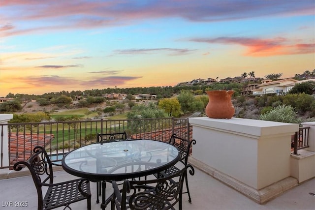 view of patio terrace at dusk