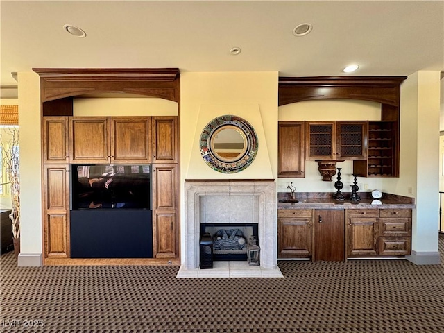 kitchen featuring a tiled fireplace