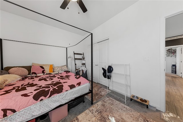 bedroom featuring ceiling fan and a closet